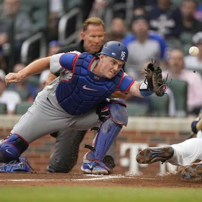 Will Smith attempts to tag out Sean Murphy